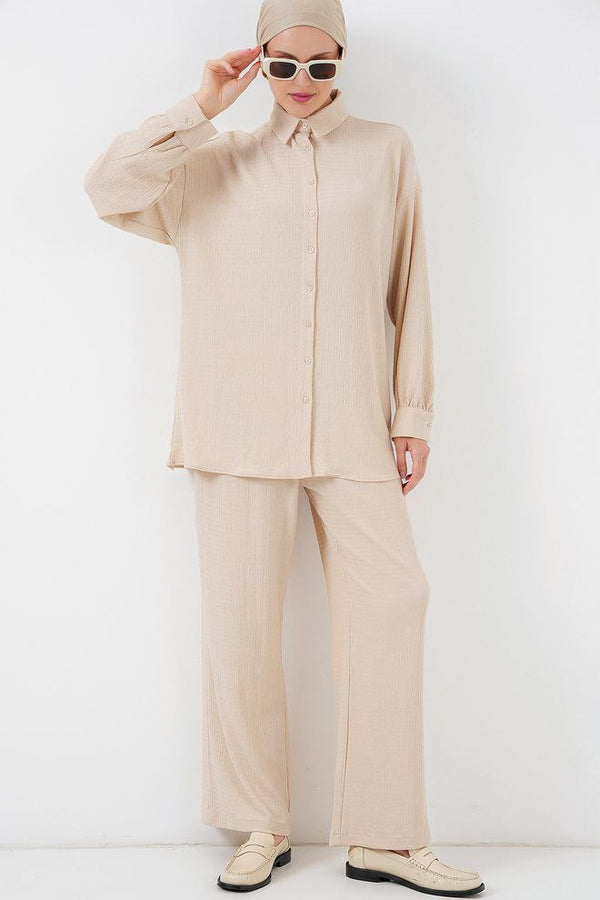 "Chic and modest two-piece set featuring a tailored top and wide-leg trousers — effortlessly elegant for both hijabi and non-hijabi looks."