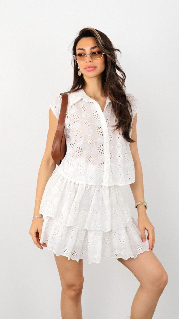 A white short skirt — chic, fresh, and perfect for a light, stylish look.